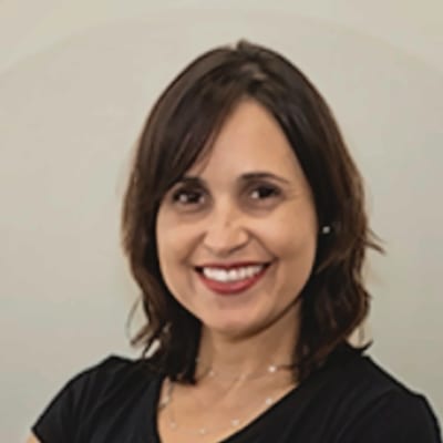 Rosto da professora Cristiane Barros